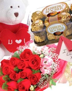 12 Roses+ 16 Ferrero and small Teddy w/pillow & valentines card